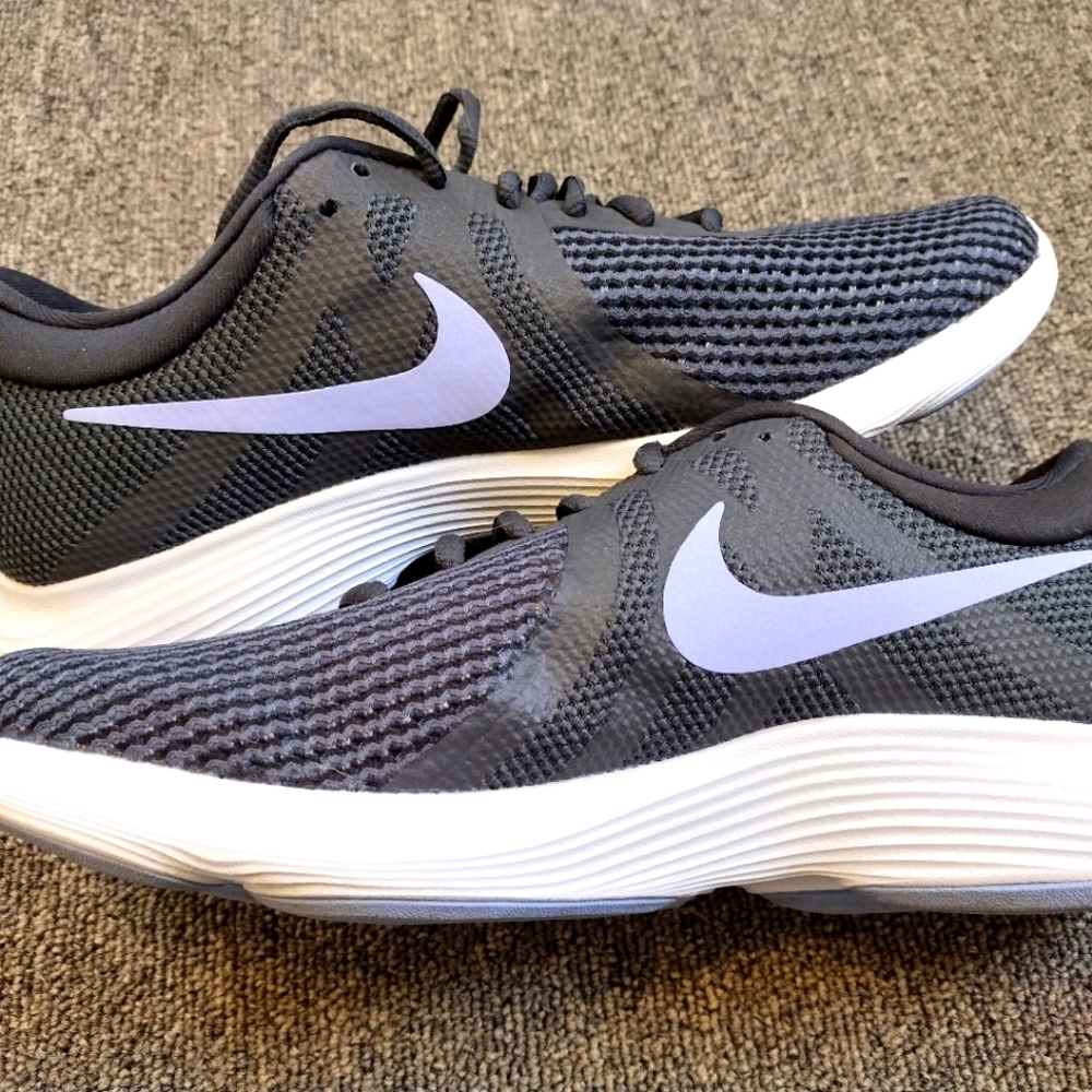 Women's Nike Revolution 4, size 9.5, anthracite/twilight black w purple swoosh